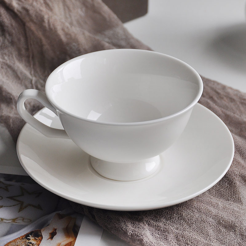 White Ceramics Cup And Saucer Set