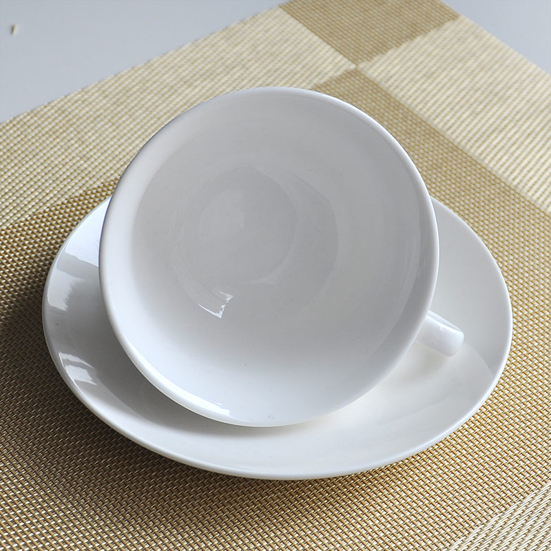 White Ceramics Cup And Saucer Set