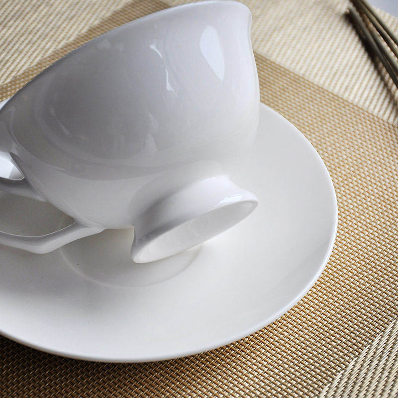 White Ceramics Cup And Saucer Set